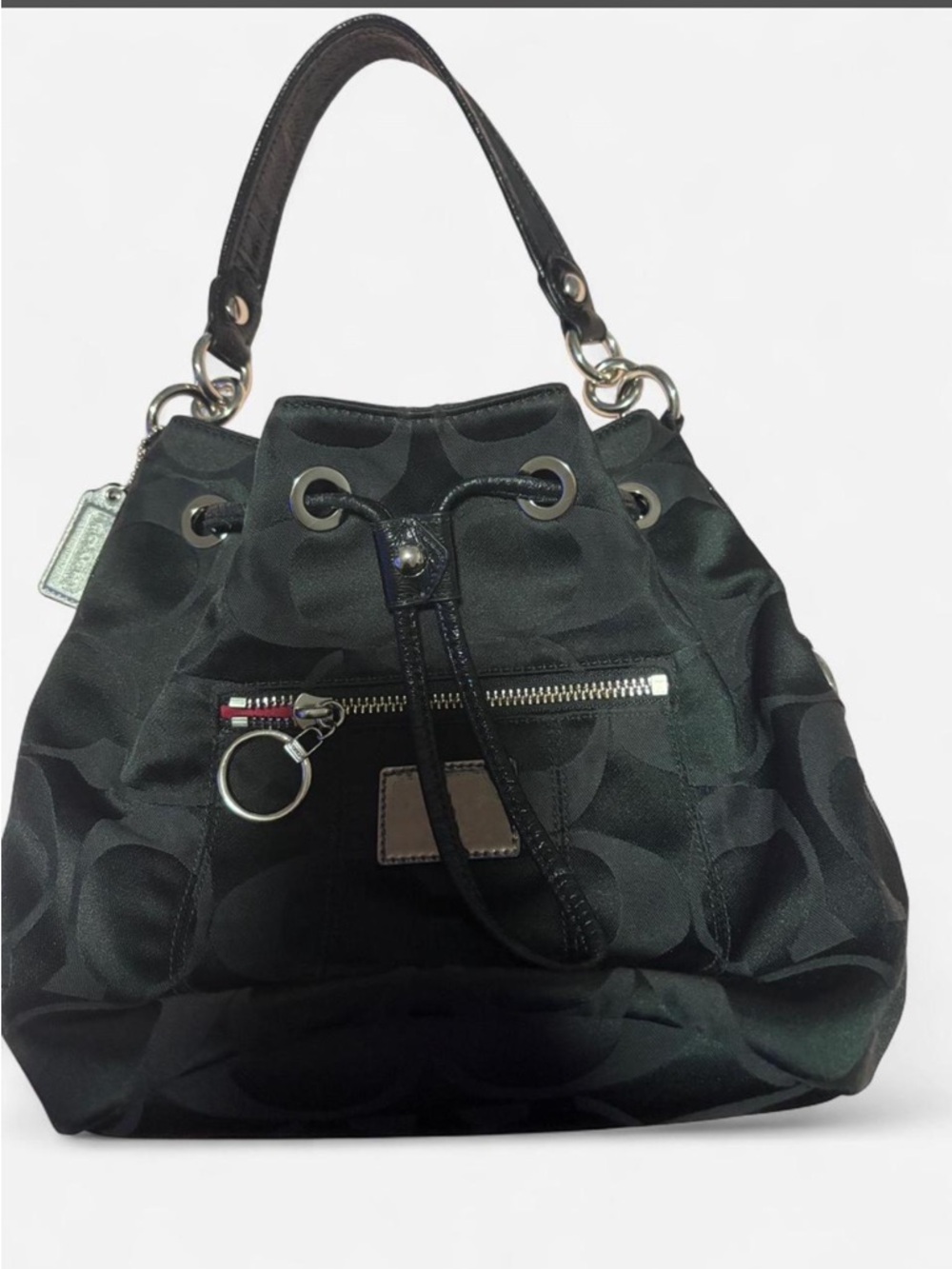 Vintage Y2K Coach Poppy drawstring bag with silver hardware